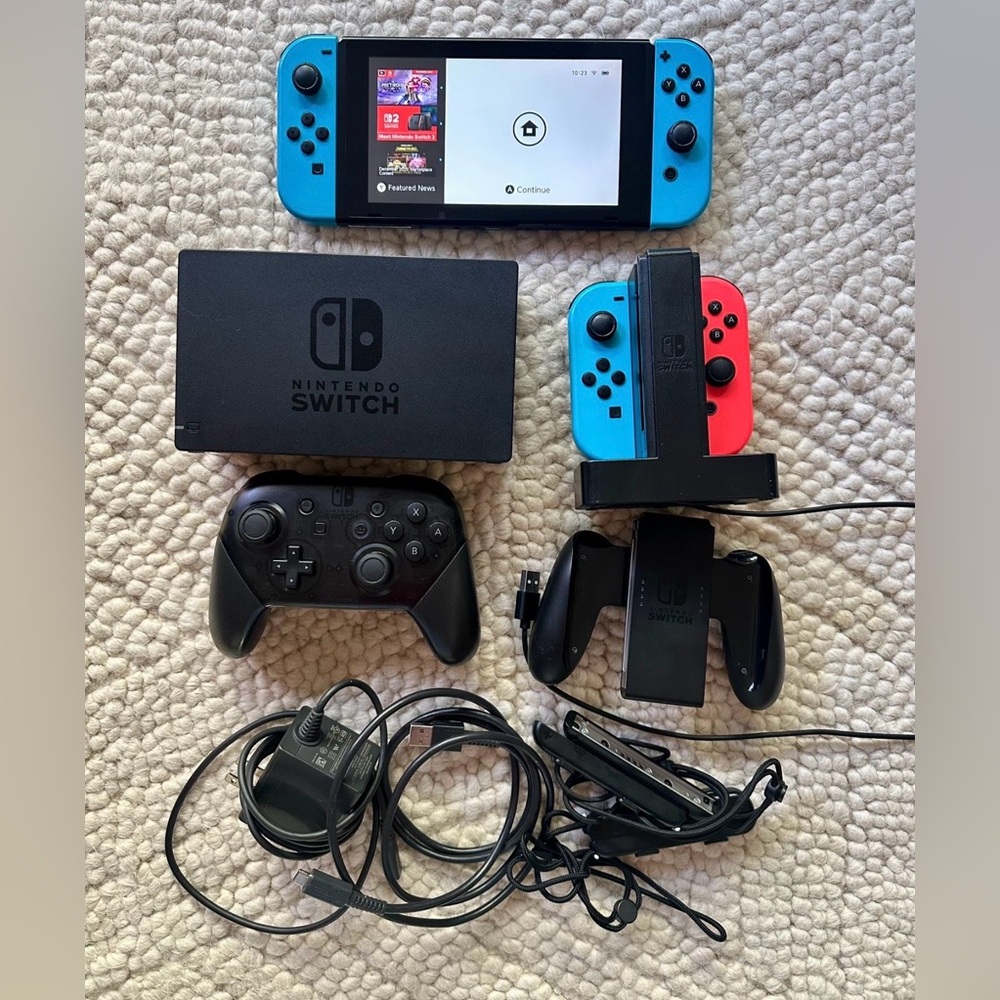 Nintendo Switch with accessories and 9 games / case / charger / pro controller